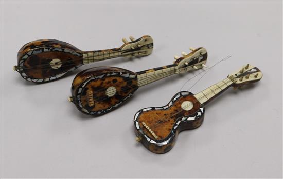 Three tortoiseshell miniature instruments